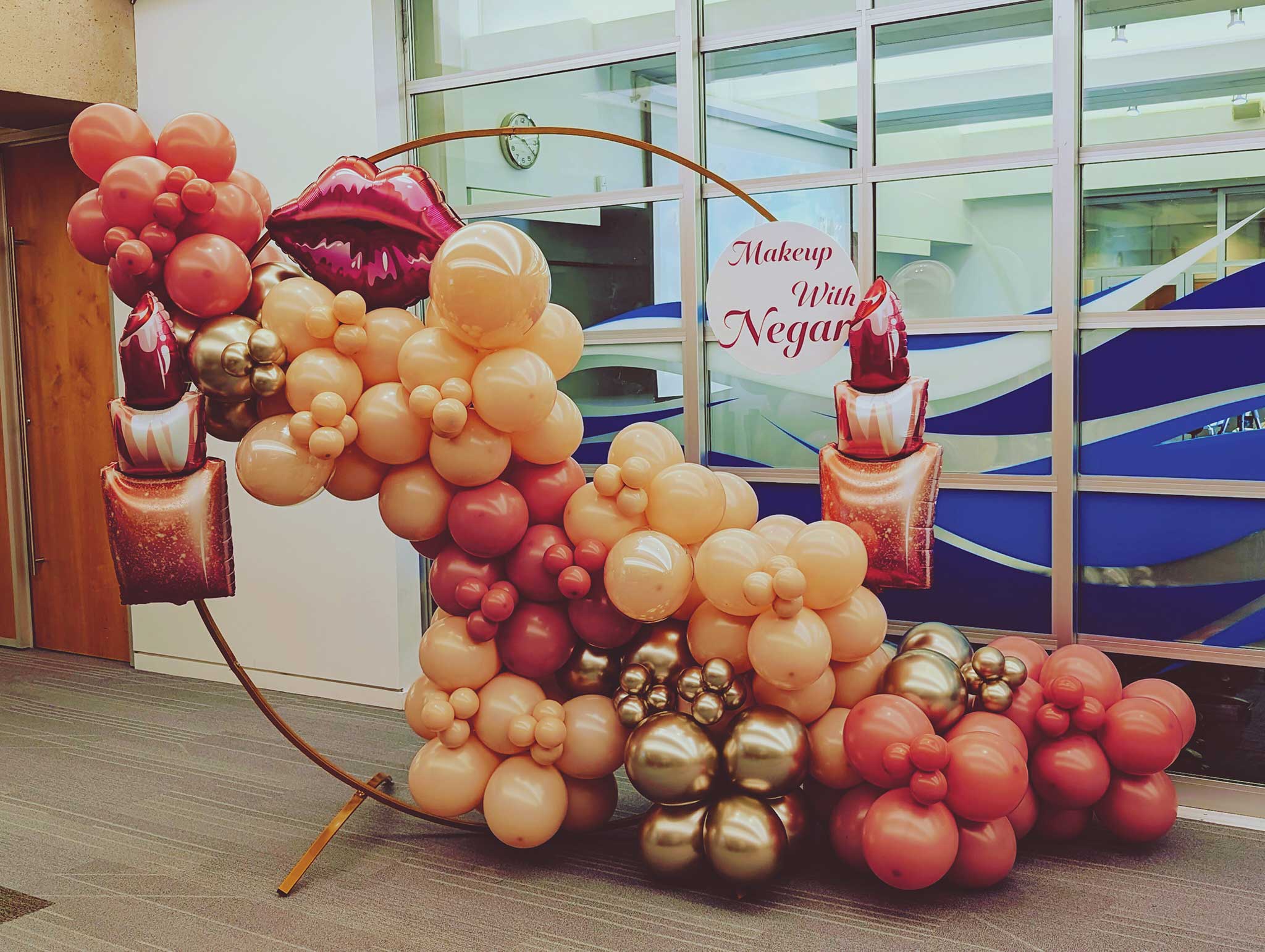 Custom event backdrop by Pampas and Bloom for a corporate makeup masterclass in Vancouver